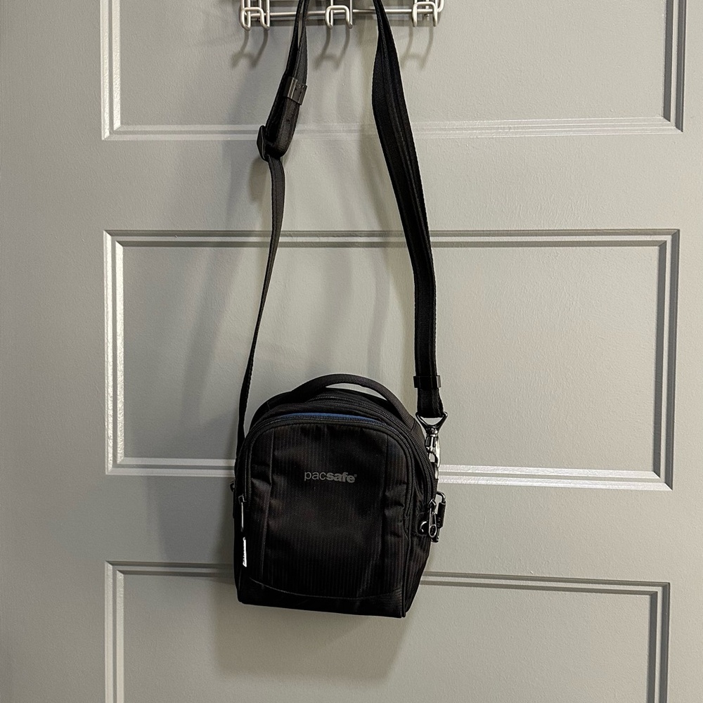 Pacsafe Black LS100 anti-theft crossbody bag